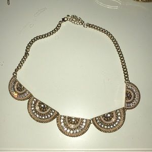Gold and white necklace